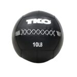 TKO's Wall Ball is a 14" heavy-duty vinyl covered, weighted ball designed to enhance your strength training workouts. The Wall Ball features a soft and forgiving fill but durable enough to hold its shape overtime. Heavy duty vinyl coated weighted ball Black with Grey laces Durable cotton fill and heavy nylon stitching Available in 10lb / 12lb / 14lb / 16lb / 18lb / 20lb / 25lb / 30lb