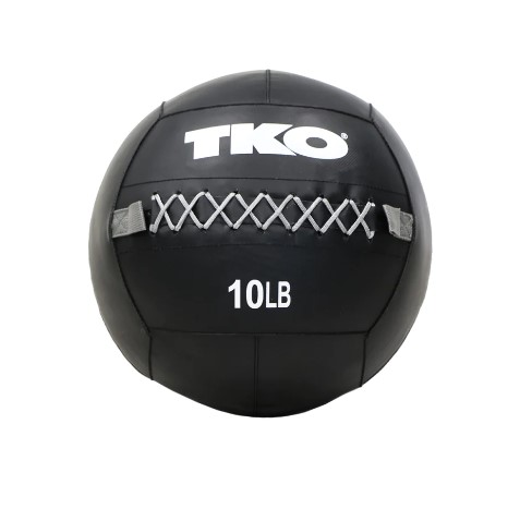 TKO's Wall Ball is a 14" heavy-duty vinyl covered, weighted ball designed to enhance your strength training workouts. The Wall Ball features a soft and forgiving fill but durable enough to hold its shape overtime. Heavy duty vinyl coated weighted ball Black with Grey laces Durable cotton fill and heavy nylon stitching Available in 10lb / 12lb / 14lb / 16lb / 18lb / 20lb / 25lb / 30lb