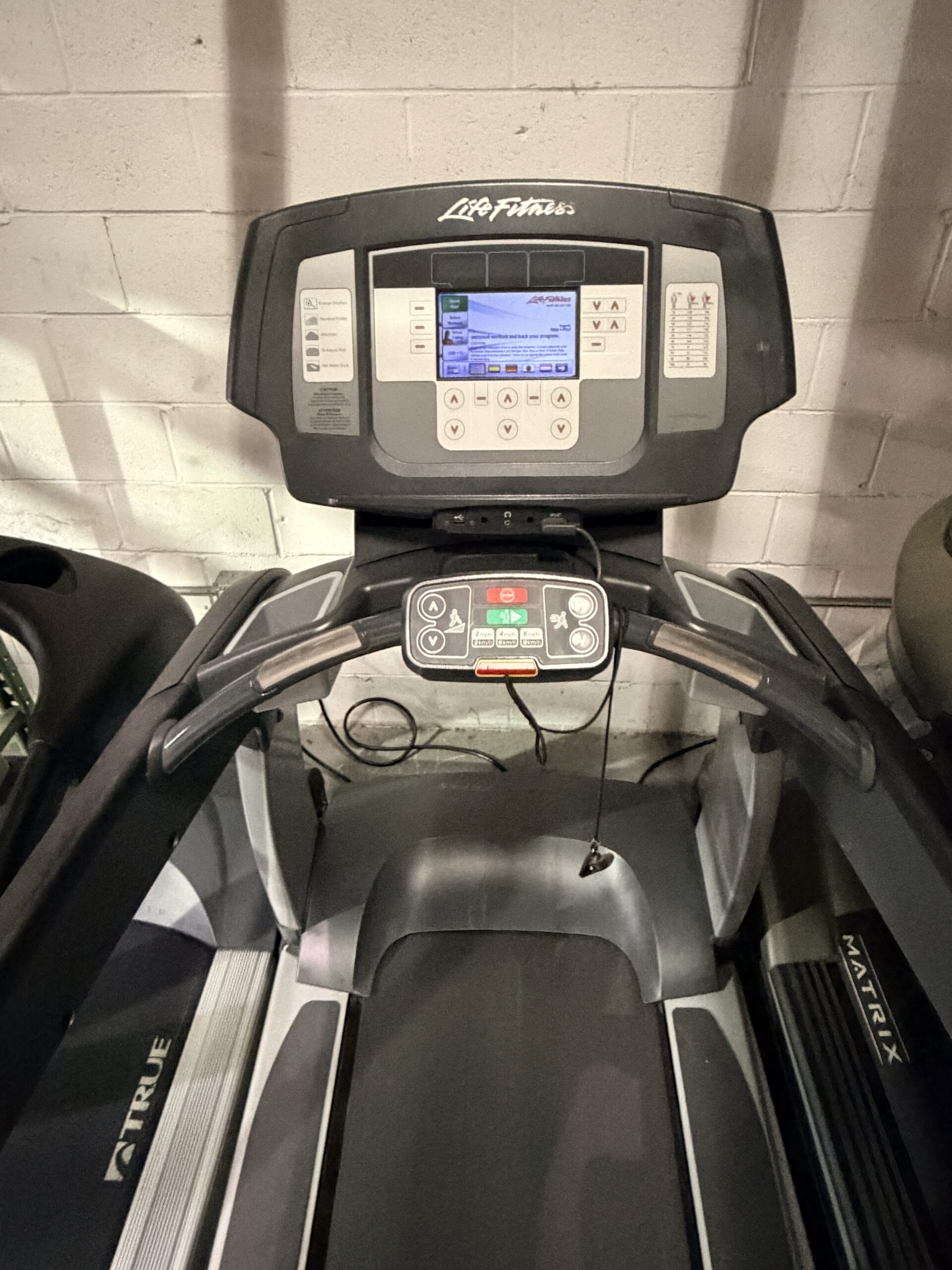 Life Fitness 95T Inspire Treadmill featuring an Inspire touchscreen console, commercial-quality construction, and smooth performance, available at Innovative Fitness in Kennesaw, Georgia."