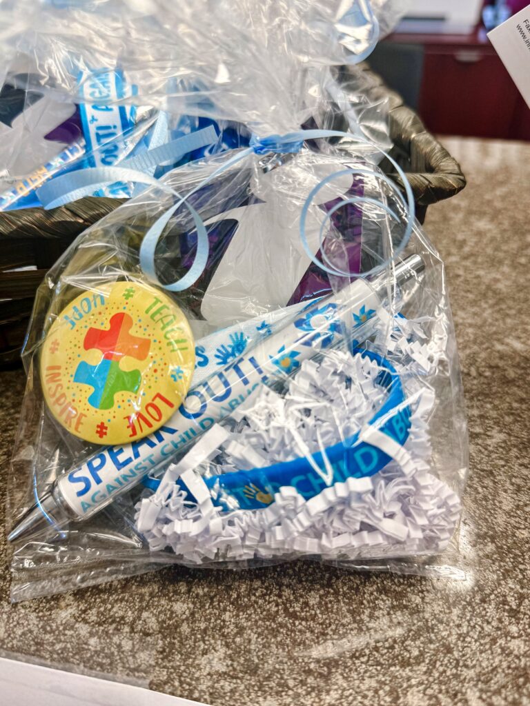 For our April Service Project, we are especially excited to spread awareness about two causes that are incredibly close to our hearts—Child Abuse Prevention and Autism Awareness. We have two amazing autistic kids in our work-family and understand firsthand how important it is to raise awareness and create a supportive community. We also have a work-family member who is a CASA (Court Appointed Special Advocate) in Cherokee County, advocating for the best interests of children in the foster care system.