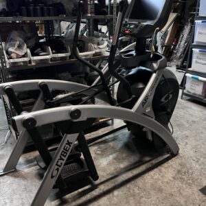 FEATURES The Cybex 525AT Arc Trainer is a high-end commercial cross training workout machine that can be used primarily for weight loss, cardio, and strength training. DISPLAY Easily view your time, strides per minute, calories burned, and heart rate on a graphic 8 by 5 LED screen. GLIDE, STRIDE, AND CLIMB ZONES Choose from 21 different incline levels to workout in Glide, Stride, or Climb. Spending time in each will work on different muscles and help increase your endurance. LOAD DEPENDENCY This machine is designed to scale its resistance according to your weight, making sure you get the best training no matter what size you are. MUSCLE TARGETING The 525AT’s unique range of incline and resistance settings make it possible for you to target different muscle groups for overall strengthening and conditioning. REVERSE ARC MOTION This advanced stride technology makes your legs and feet move in a natural, biomechanically correct pathway, thus preventing injury and stress to the joints. WORKOUT SELECTIONS Customize your training session by selecting one from Quick Start (Manual mode), three weight loss modes, three cardio, and two strength. Each workout program has 10 levels and controls both the incline and resistance during your session. Cybex 525AT Arc Trainer OPTIONAL ACCESSORIES E3 HD VIEW MONITOR A 15.6 inch high definition screen that is embedded into the machine’s display area with three different viewing modes. With this high-quality screen, you’ll be able to make sure you’re only seeing what you want during your training session. CUSTOMIZED APPEARANCE Match the machine with any decorating scheme by choosing from white, black, black chrome, metal tone gold, or even platinum sparkle. Or, go beyond and choose from over 180 additional custom colors. The Cybex 525AT Arc Trainer with E3 View Embedded Monitor is great for meeting a lot of different strengthening and conditioning standards. Now you can: Keep track of your heart rate using wireless grips. Match the resistance and incline to your physical capabilities and training needs. Build up your endurance and training in strength, endurance, cardio, power, and weight loss. Work on different muscle groups by alternating between the Glide, Stride, and Climb positions. Save yourself from unnecessary knee and hip joint strain with your legs kept in the proper biomechanical position during your session.