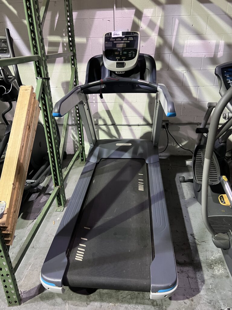 The contemporary, thoughtful design of the new TRM 835 delivers exercisers unparalleled feel and quiet operation while facility operators experience optimal performance and durability. The Active Status Light alerts facility staff at a glance to the operating status of their treadmills. Features Ground Effects Impact Control System: New and improved progressive shock absorption system that absorbs high-impact movements and supports a solid and controlled push off. Ground Effects Technology: Yes Integrated Footplant Technology: Fully complements exercisers natural running stride, reducing joint stress and fatigue. Motor: IFT-Drive controller works with a new, high efficiency 4 HP AC motor that delivers improved performance and a smooth, natural feel. Deck and Belt: Seigling E8 multi-ply polyester belt with optimized lubrication integrated into the material, exclusive to Precor. The running belt is combined with a pre-waxed deck that offers added lubrication especially during the initial break-in period of the treadmill. The combination of the exclusive optimized running belt with pre-waxed deck yields a long lasting system. However, when the running belt does need to be replaced and the deck flipped, this service can be completed in less than 20 minutes. The deck is mounted to the GFX system independent of the frame resulting in a stable, quieter treadmill. Reversible Deck: Yes Elevation System: Elevation system generates up to 1000 lbs of thrust and operated in compression for reliable operation. Rollers: Steel tapered rollers keep the belt centered to reduce maintenance and noise. Frame: New frame design results in an ultra-stable console, solid feel, and quiet operation. Water Bottle and Accessories Holder: Dual holders with rubber over mold cradles exercisers water bottle to keep it stable. Accessory tray securely supports exercisers cell phone, keeping it front and center, along with ample room for keys, membership card, etc. Emergency Stop: Safety clip and lanyard attached to the stop switch to immediately turn off power bringing the treadmill to a stop. The lanyard and safety clip can be conveniently attached to a thoughtful tab located underneath the front handrail. Auto Stop: Yes Power-Factor Correction: Yes Transport Wheels: Yes Console Type: LED QuickStart: Yes Motion Controls: Yes Numeric Keypad: Yes Units Selection: Metric or U.S. Standard Preset Programs: 25 programs accessed directly by 6 buttons: Manual, Interval, 1:1, 1:2, 1:3, Custom Interval, Heart Rate, Basic HRC, Custom Weight Loss HRC, Weight Loss HRC, Weight Loss, 1 Aerobic, 2 Aerobic, Variety, Random, 1 Cross Country , 2 Cross Country , 1 Gluteal, 2 Gluteal , 1 Custom, 2 Custom, Performance, Track, 5K, Gerkin Fitness Test, USAF PRT, Navy PRT, Army PFT, USMC PFT, Federal Law Enf. PEB, WFI Firefighter Test Console Language(s): Dutch, English, French, German, Italian, Romanized, Russian, Spanish Maximum Pause Time (Pause): 120 seconds Electronic Readouts: Speed, Incline, Distance, Pace, Average Speed, Calories, Heart Rate, Time Elapsed, Time Remaining, % Complete, Time in, Zone, Segment Time, Cals/min, Cals/hr, Watts, METS, Target HR, Average HR, Elevation Gain, Workout Summary Maximum Workout Time: unlimited Touch: Touch heart rate sensors located on fixed handlebars for increased accuracy and ease-of-use by users of all sizes. Telemetry: Equipped for heart rate telemetry reading using a chest strap. Reading Rack: Integrated CSAFE Ready: Yes Diagnostics: Ability to set club parameters, e.g. limit exercise time, set default language and pause time. Speed Range: .5 – 16 mph / .8 – 25.5 km/h Decline / Incline Range: -3% decline to 15% incline in 0.5% increments Running Surface (L X W): 60 L x 22 W inches / 153 L x 56 W cm Step-up Height: 9.5 inches / 24 cm Roller Diameter (inches / cm): 3.5 inches / 8.9 cm Power Cord Management: ICE 320-C19 inlet supporting Schuko and BSI plugs Handrail Length (inches / cm): 24 inches / 61 cm Height with PVS: 78 inches / 198 cm Equipment: Powered Personal Viewing Screen (PVS): Powered U.S. & Canada 120 VAC: Dedicated 120V/20A circuit with 5-20R NEMA receptacle U.S. & Canada 240 VAC: Dedicated 220V- 240V/20A circuit with 6-20R NEMA receptacle International 240 VAC : IEC 320-C19 inlet supporting applicable country-specific power cord Cord Length: 12 ft / 3.7 m TECH SPECS – Max User Weight: 400 lbs (181.5 kg) Weight: 420 lbs (190.5 kg) Dimensions: 83″ L x 35″ W x 62″ H / (211 x 89 x 157.5 cm)