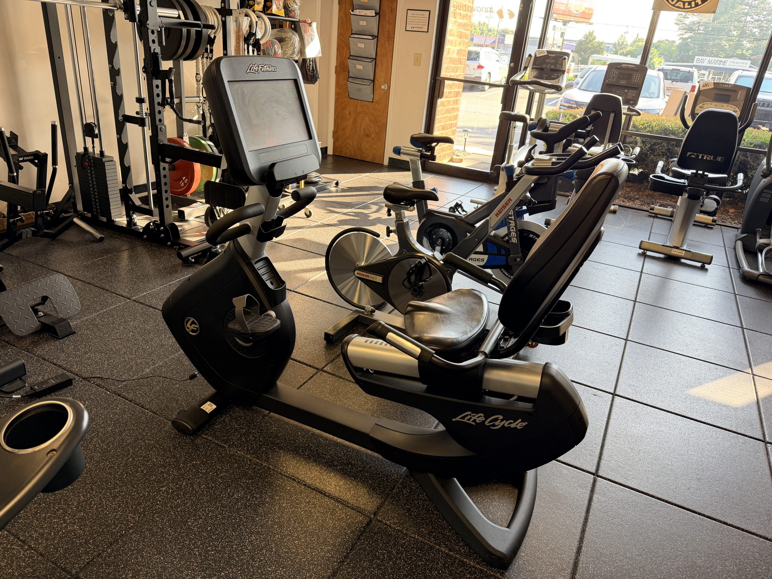 Life Fitness 95RS commercial recumbent exercise bike with touchscreen console available at Innovative Fitness in Kennesaw, GA.