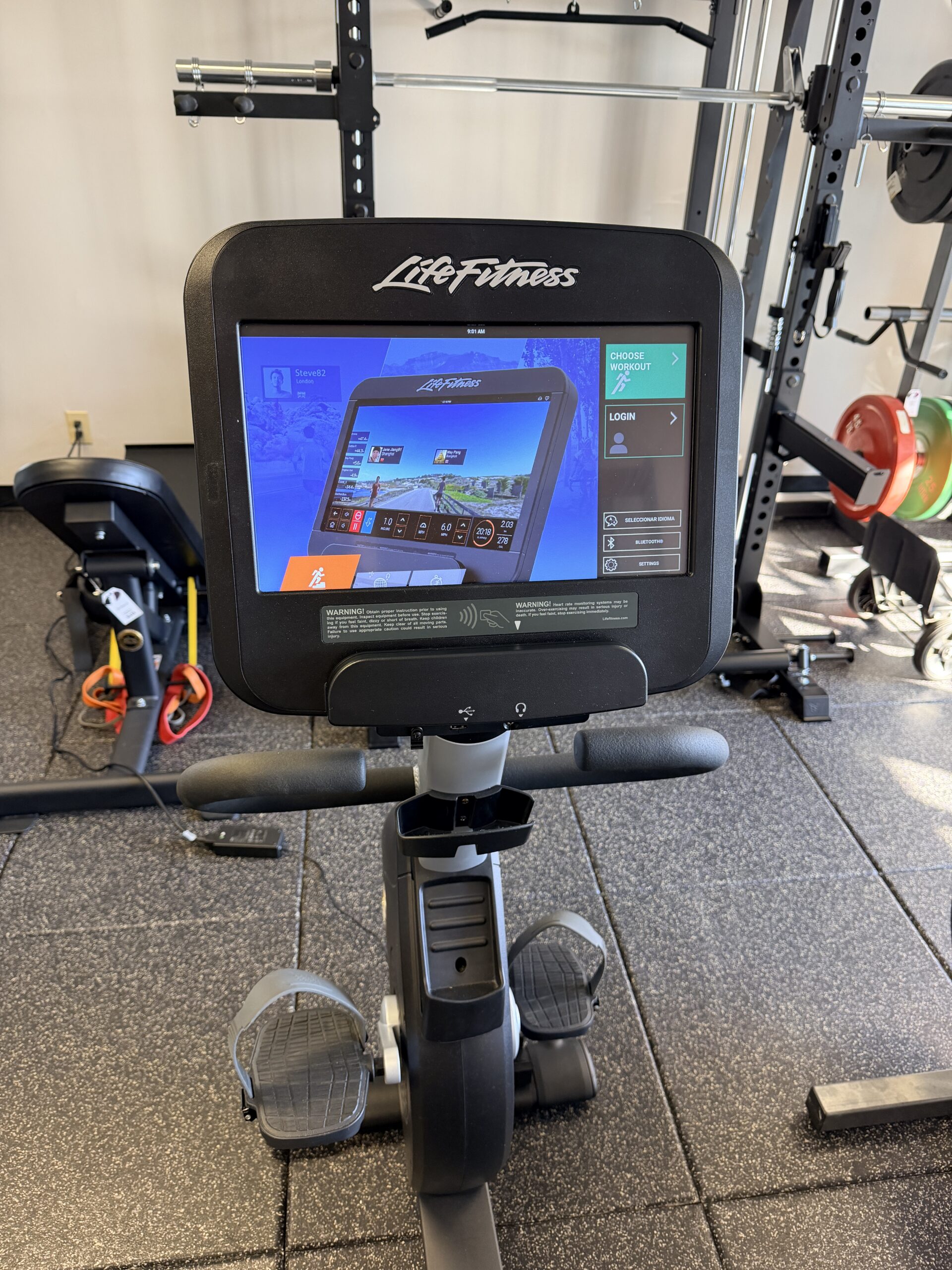 Commercial-grade Life Fitness 95RS recumbent fitness bike with touchscreen console for low-impact cardio workouts at Innovative Fitness in Georgia.