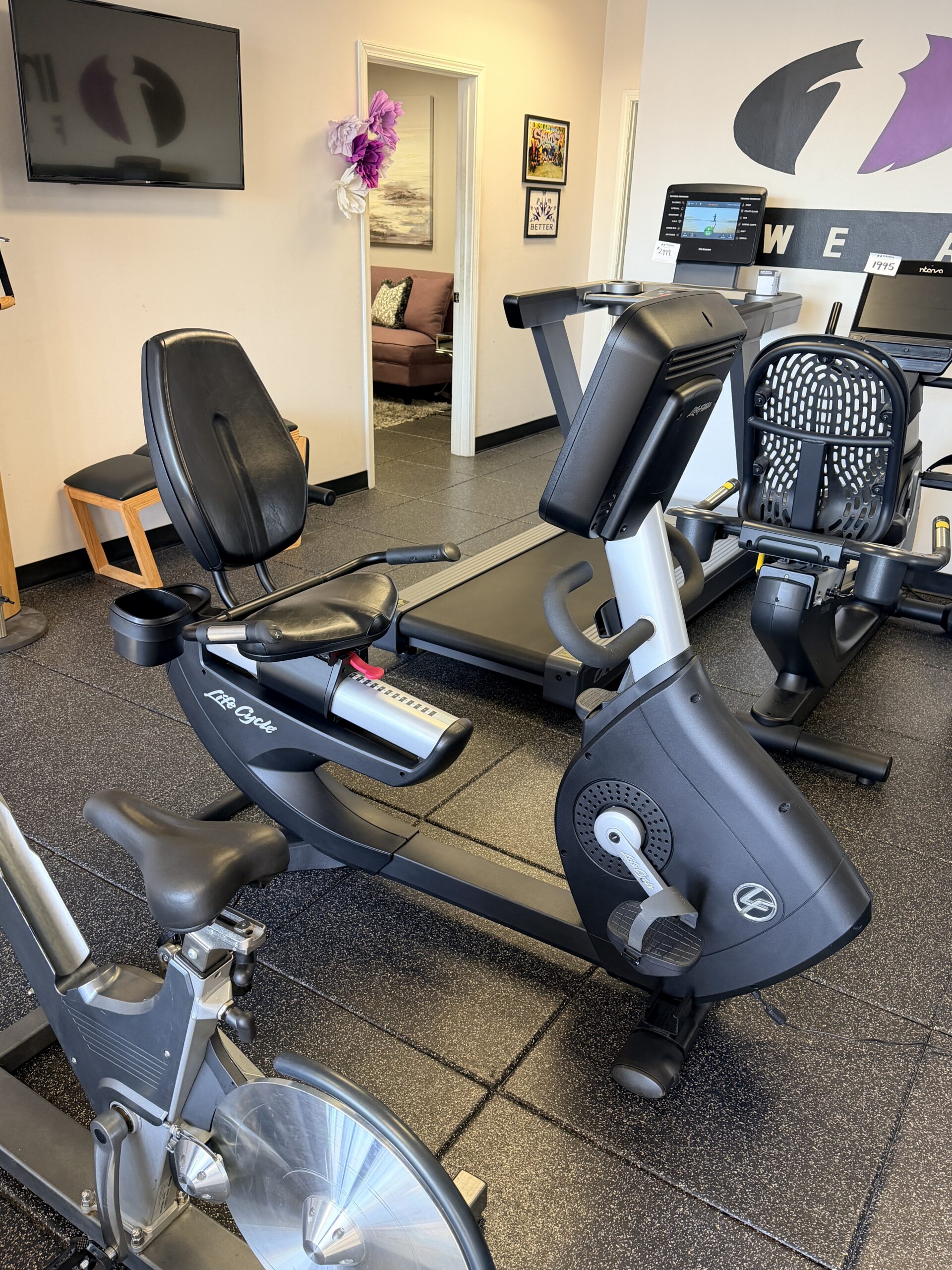 Life Fitness 95RS Recumbent Bike with touchscreen console on display at Innovative Fitness in Kennesaw, Georgia, featuring commercial-grade construction, ergonomic seating, and low-impact cardio training.