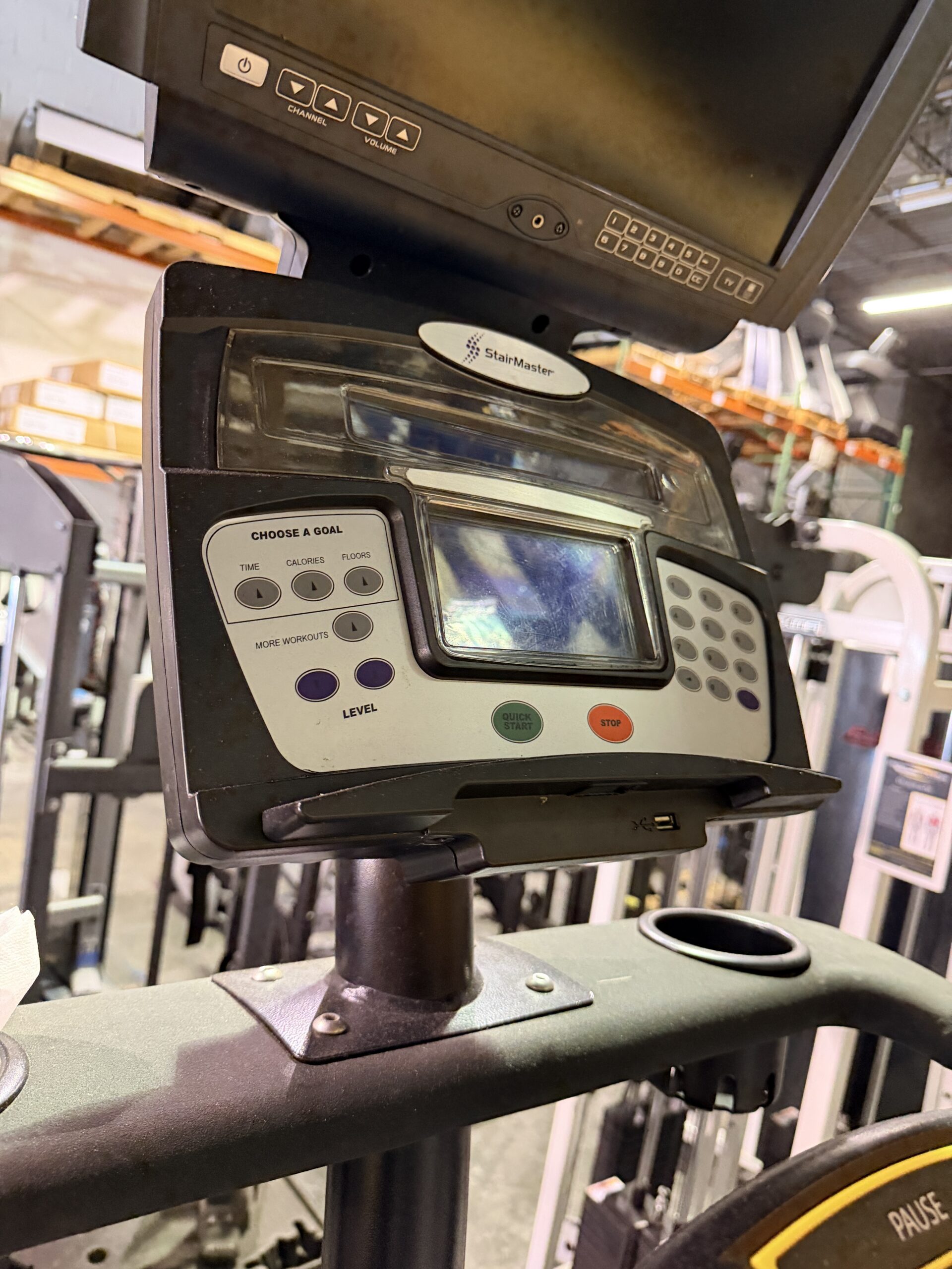 StairMaster Gauntlet Stepmill with LCD D-1 Console and integrated TV screen available for sale at Innovative Fitness in Kennesaw, Georgia, featuring commercial-grade stair climbing performance.