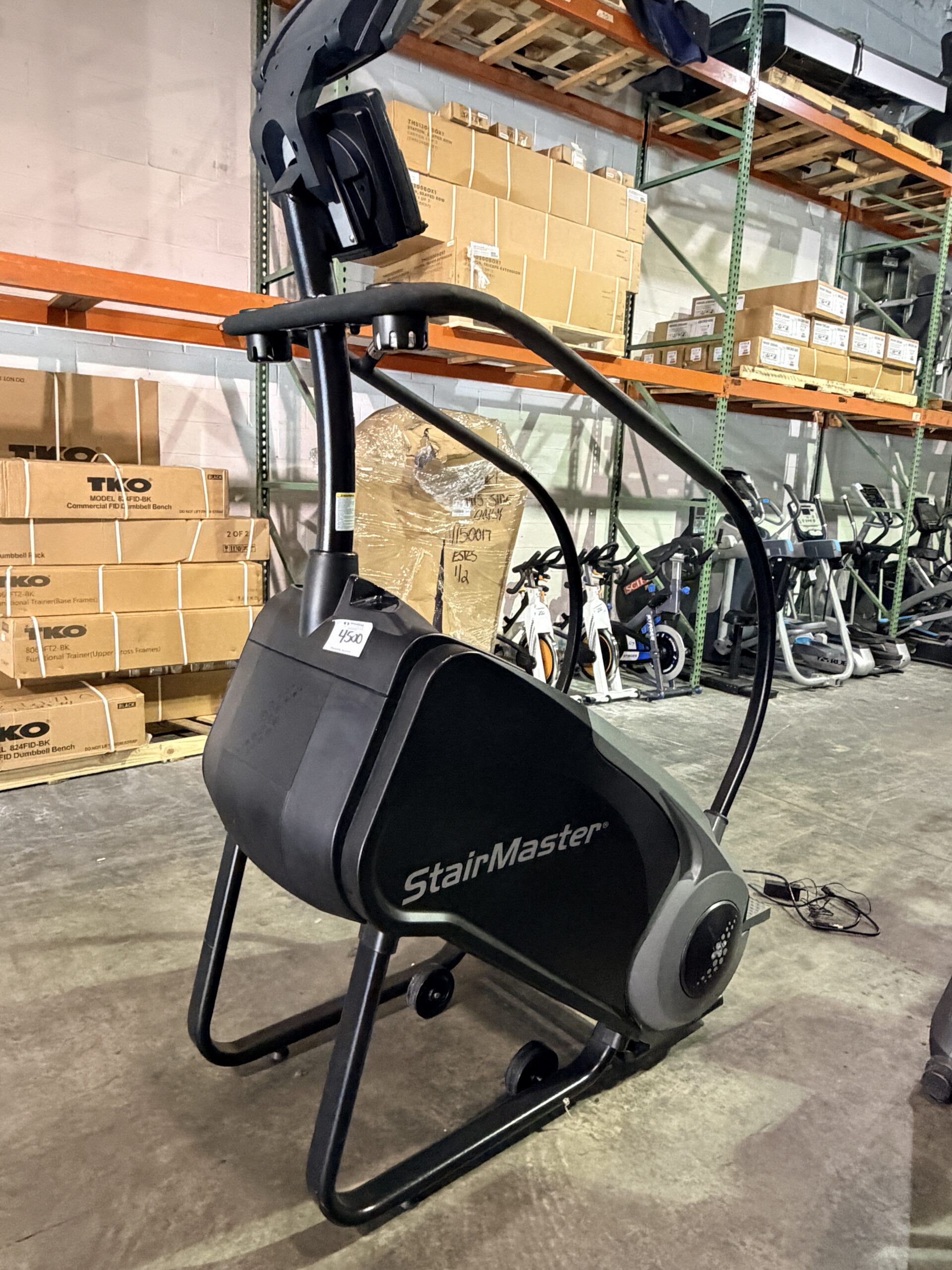 StairMaster Gauntlet Stepmill with LCD D-1 Console and integrated TV screen available for sale at Innovative Fitness in Kennesaw, Georgia, featuring commercial-grade stair climbing performance.