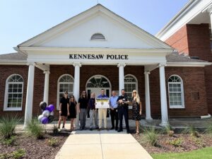 CCMG committee members visiting the Kennesaw Police Department during the 2026 Chris Conti Memorial Grant site visit to evaluate the future fitness facility location.