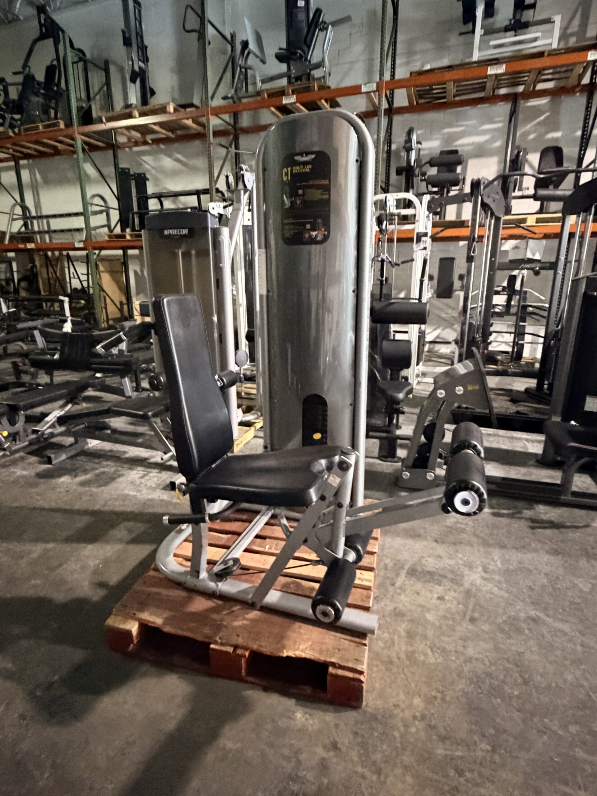 Inflight Fitness Multi Leg Extension and Leg Curl machine at Innovative Fitness in Kennesaw, GA, for commercial gym strength training.