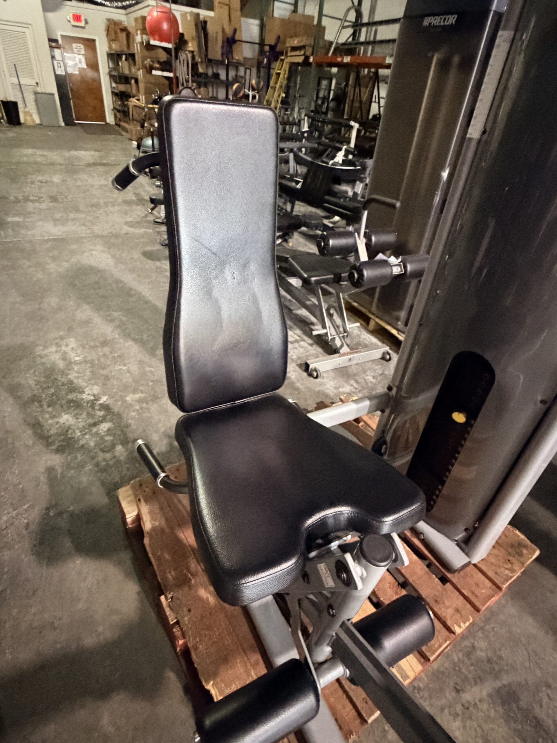 Inflight Fitness Multi Leg Extension and Leg Curl machine at Innovative Fitness in Kennesaw, GA, for commercial gym strength training.